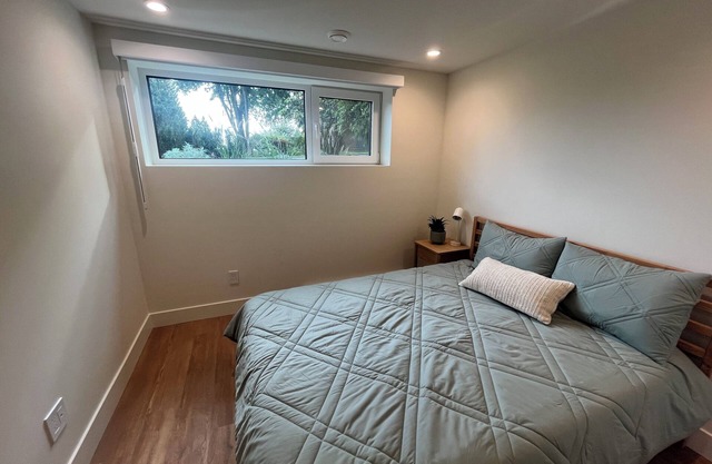 Enjoy the mountains and the ocean from this clean and cozy Deep Cove Suite