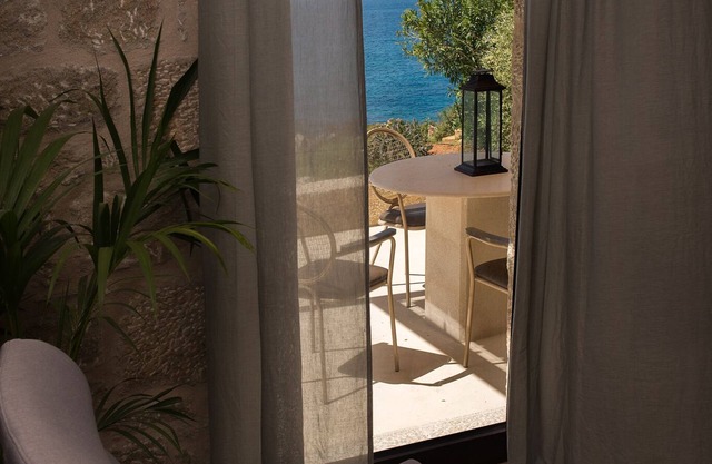 Enjoy the relaxation of chic seaside living in a sea view stone villa