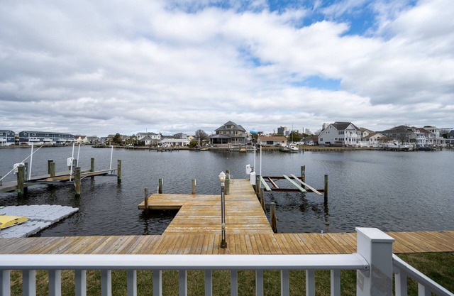Enjoy the serene beauty of coastal living in his spacious 4-bedroom home