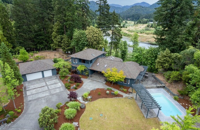 Enjoy the Serenity and Quiet on this 5-acre Estate with Mountain and River Views