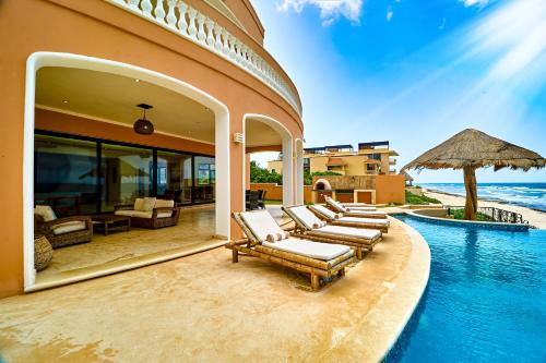 Exclusive Oceanfront Retreat in Tulum with Infinity Pool and Caribbean Views