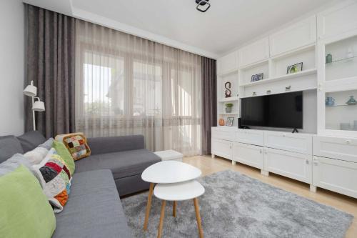 Family Apartment with Parking in Pruszków by Noclegi Renters