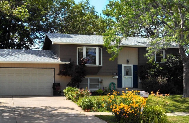 Family friendly, 4 bedrooms, big yard, a cook's kitchen, & treasure!