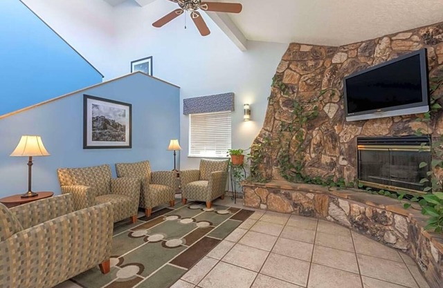 Featuring a year round indoor pool and a hot tub .