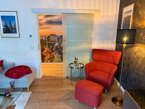 Ferienwohnung Lucy - Moderne Ferienwohnung mit kostenlosem Parkplatz, Terrasse, nahe Bad Schandau und Malerweg