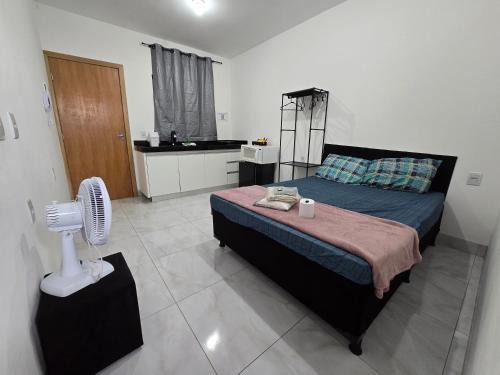 Flat completo a 6 minutos de mercado e praça