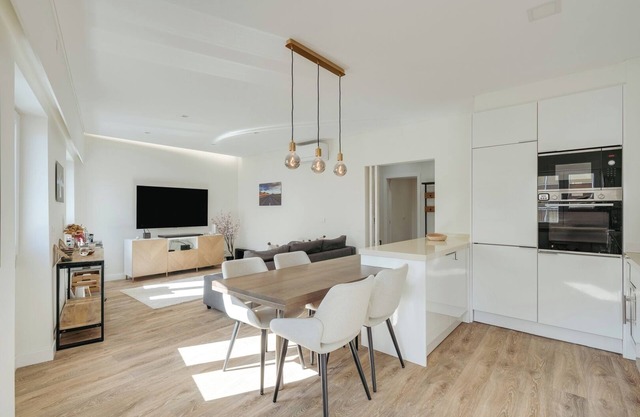 Flat w/Balcony and Workspace by HostWise