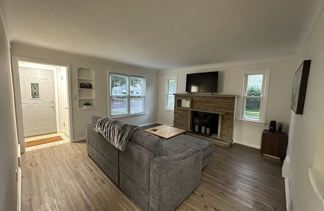 Fully updated house with a fenced in yard and close to highways and hospitals!