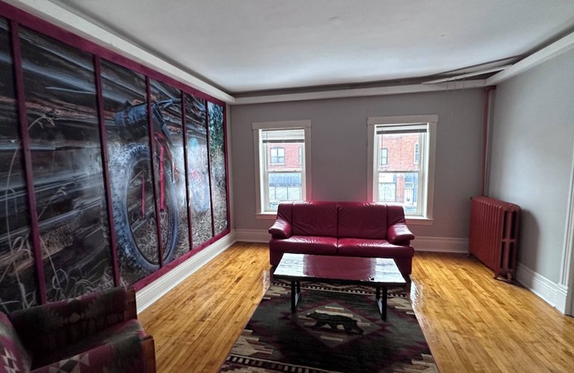 Fun 2-bedroom downtown 2nd floor loft style apartment with WiFi and theater room