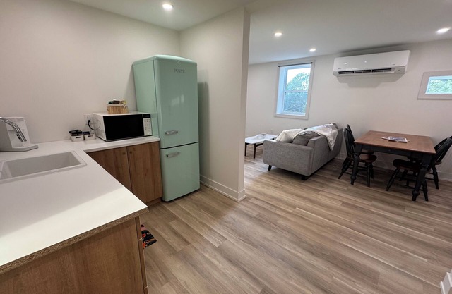 Golden Acre Suites | 2BR Downtown w/Exposed Brick & Retro Retreat