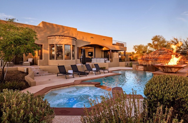 Heated pool w/swim up bar, game room & much more!