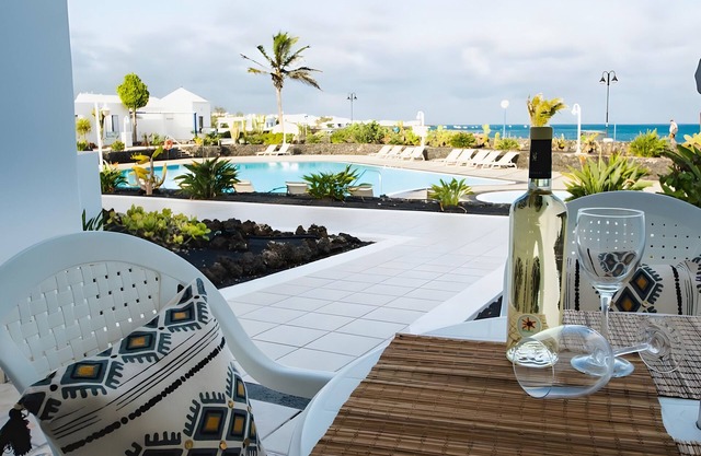 Holiday Home 'Caleta Campos Bungalows' with Sea View, Shared Pool and Wi-Fi