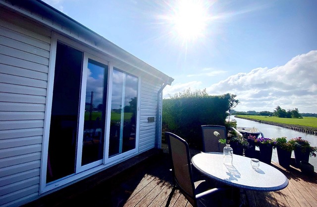 Holiday home Ela in Wervershoof with wood-fired barbecue, garden and terrace with access to the water