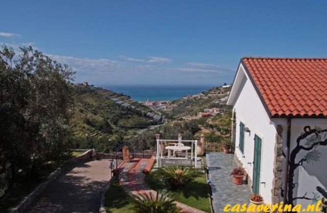 Holiday home with 3 apartments with private garden with sea view and pool.