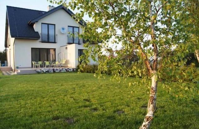 Holiday home with garden, terrace and barbecue