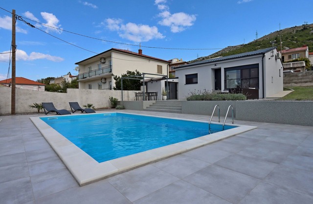 Holiday house with a swimming pool Senj (K-21661)
