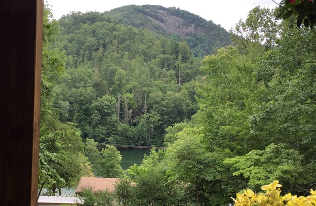 Home with huge front porch and lake views