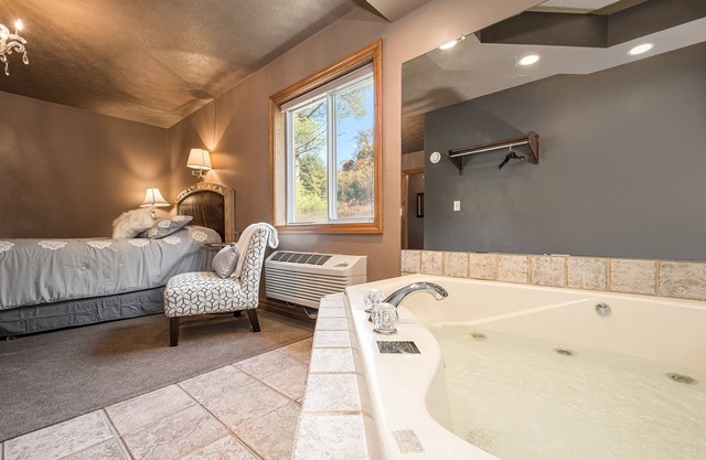 JV Thompson | Jacuzzi Tub Historic Inn Room