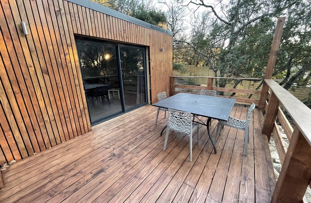 L'échapée belle is a wood-frame cottage in the heart of the forest.