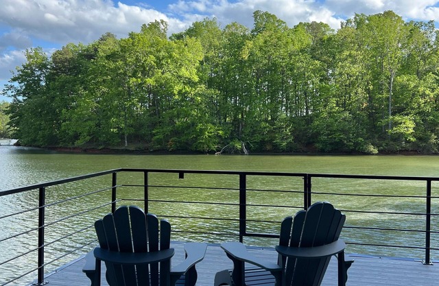 Lakefront family home w/private 2-story dock & NEW outdoor deck for dining!