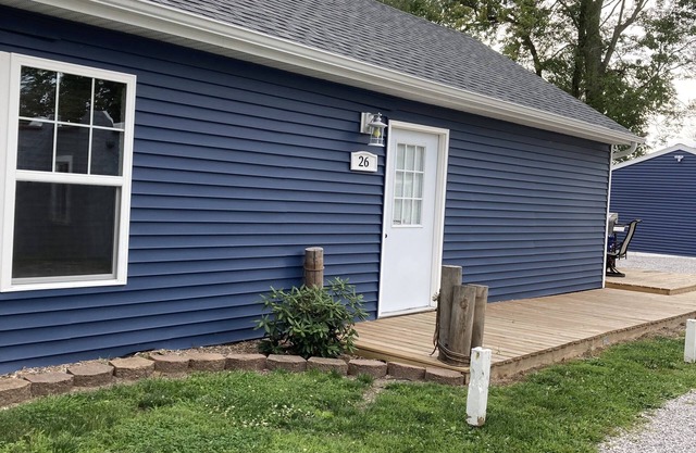 Large family cottage steps from waters edge.