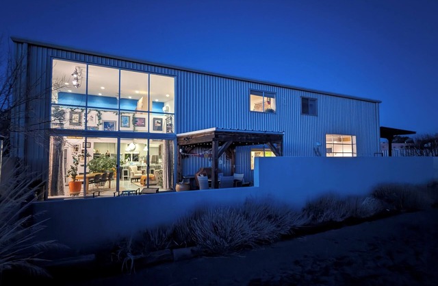 Light-filled main house close to town; views, hiking on high desert behind house