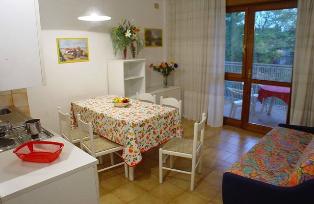 Lignano C: Living room + 2 bedrooms