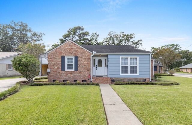 Lou Wilda House is a charming 3 bedroom home with a cozy back patio.