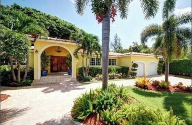 Lush gardens on the Earmen River with heated pool