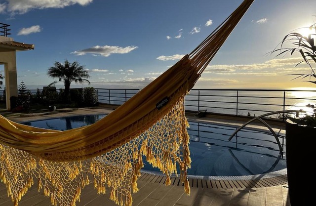 Luxury villa with private heated pool, garden and views of the sea and mountains.