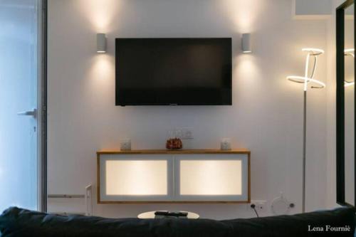 Maison chaleureuse jacuzzi, climatisation et parking payants