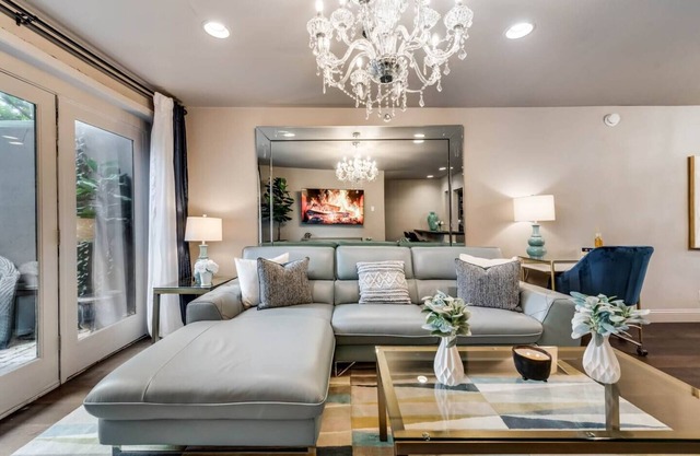 Modern 2BR, 2BA luxury condo in central Dallas with private patio, designer interiors, and access to award-winning courtyard retreat.