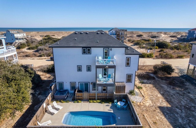 Modern 5br beach retreat with ocean views and salt water pool.