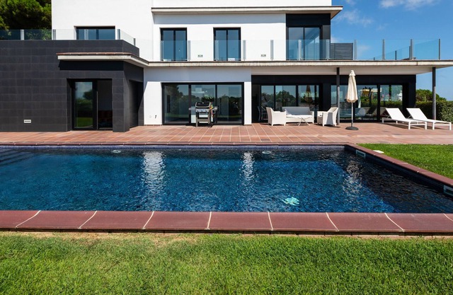Modern two-storey villa with pool in a quiet area with excellent sea view