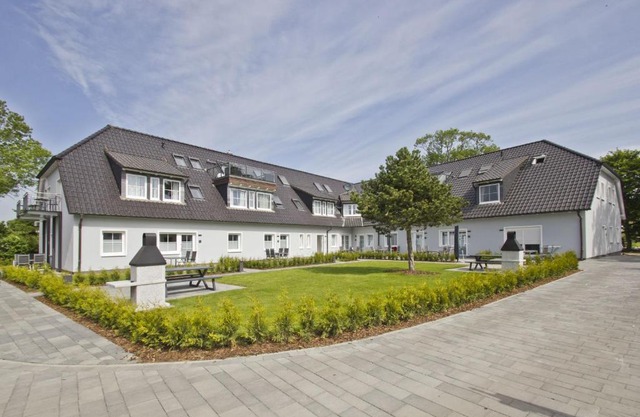 moderne Ferienwohnung mit eigener Terrasse - Haus Inselwind FeWo MEERhafen