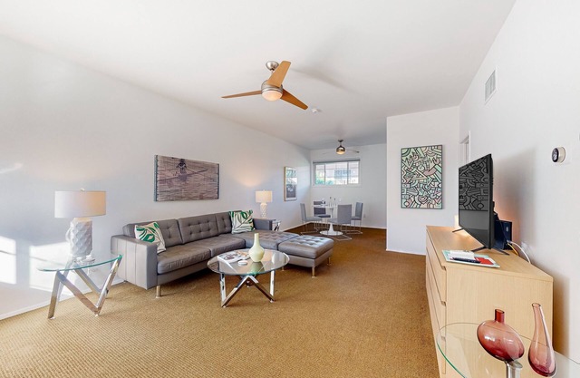 Mountain-view condo with pool, hot tub, balcony, & central AC