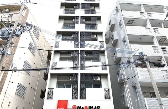 Mr.KINJO Miki24 in front of Makishi Station