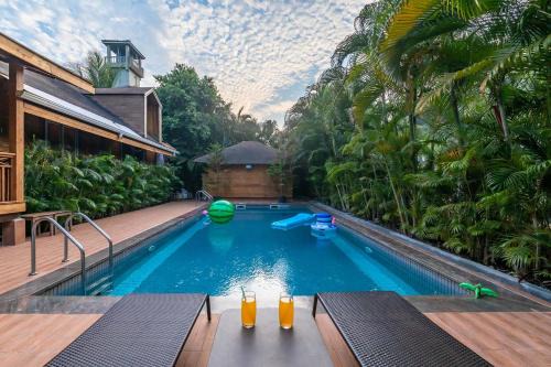 Nature's Abode - The Wooden Villa at Morjim by StayVista