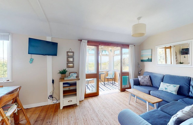 Nestled towards the far edge of the park, with direct access to the south west coast path