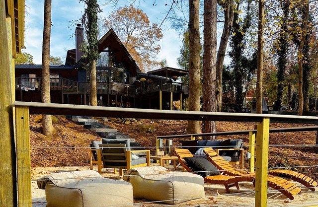 NEW LISTING Lake Front Home with private dock, game room with modern finishes!