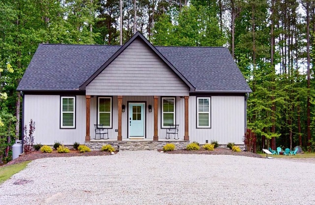 New property at Kerr Lake with dock! Family-sized w/game room and large porch!