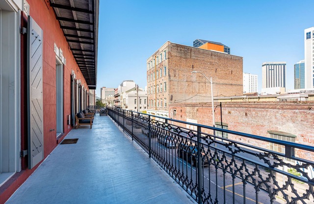📣New XL Luxury Corner Condo PRIME Historic Downtown Location HUGE Balcony Wrapped in Wrought Iron