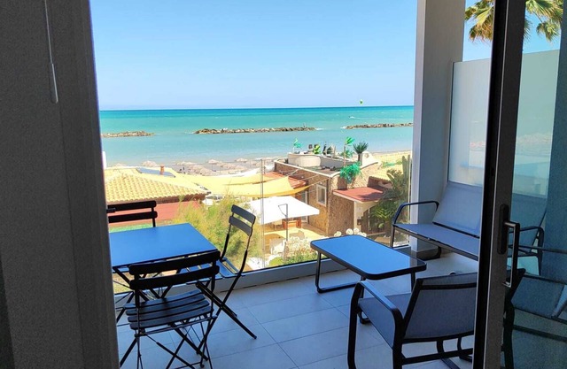newly built seafront apartment (unit 4), beach umbrella + 2 sunbeds included