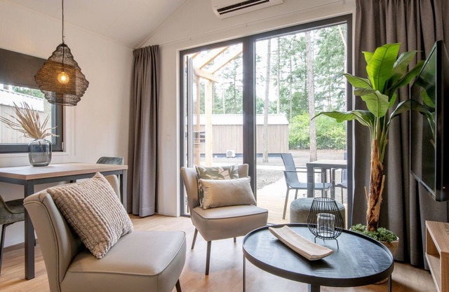 Nice tiny house with air conditioning, on a holiday park, 12 km. from Eindhoven