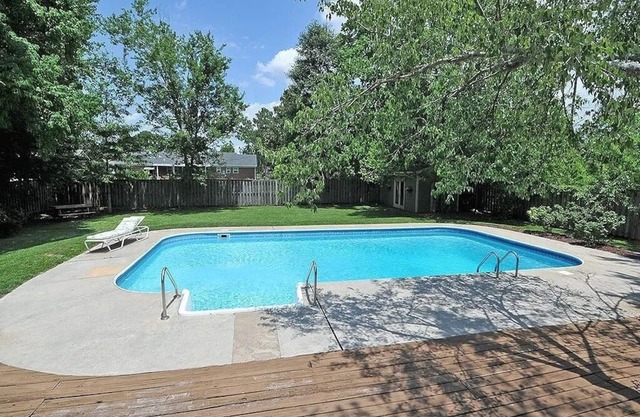 Oasis in the middle of town for large groups with pool and 2 Master bedrooms.