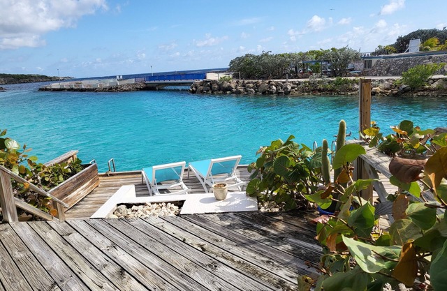 Oceanfront condo with direct access to the lagoon. TOP rated! True gem!