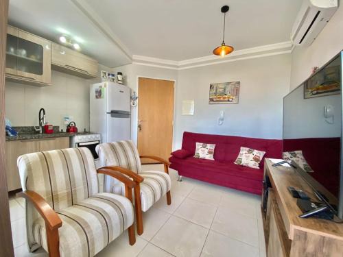 Pé na areia em Capão