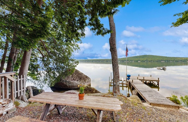 Peaceful Lakefront Escape with Outdoor Dining, Beach Access, Deck & Firepit