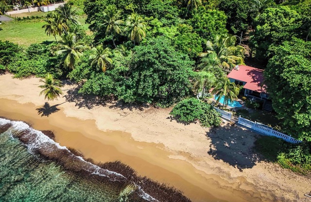 PRIVATE BEACHFRONT home with a private pool.