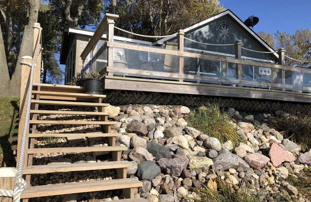 Private lake front property with huge patio!